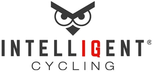 Logo for Intelligent Cycling. The word INTELLIGENT is in bold uppercase letters, with the letters I and G in red, forming IG. Above the text is a stylized owl face formed from geometric shapes.