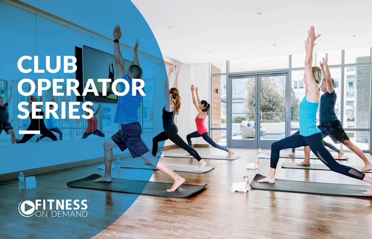A group of people practice yoga on mats in a bright studio with large windows. The text reads Club Operator Series and Fitness On Demand on a blue overlay. A TV screen is visible at the front of the room.