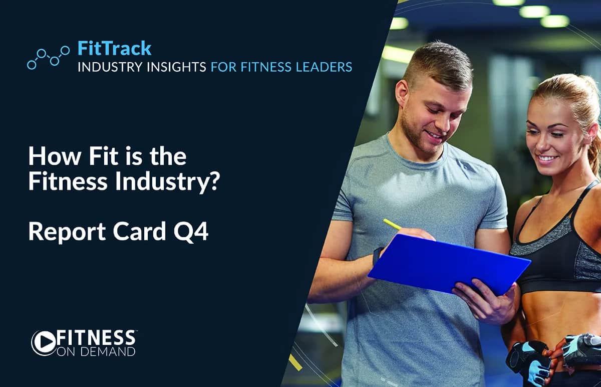 A man and a woman in athletic wear review a clipboard at a gym. Text reads: FitTrack Industry Insights for Fitness Leaders. How Fit is the Fitness Industry? Report Card Q4. Fitness On Demand.