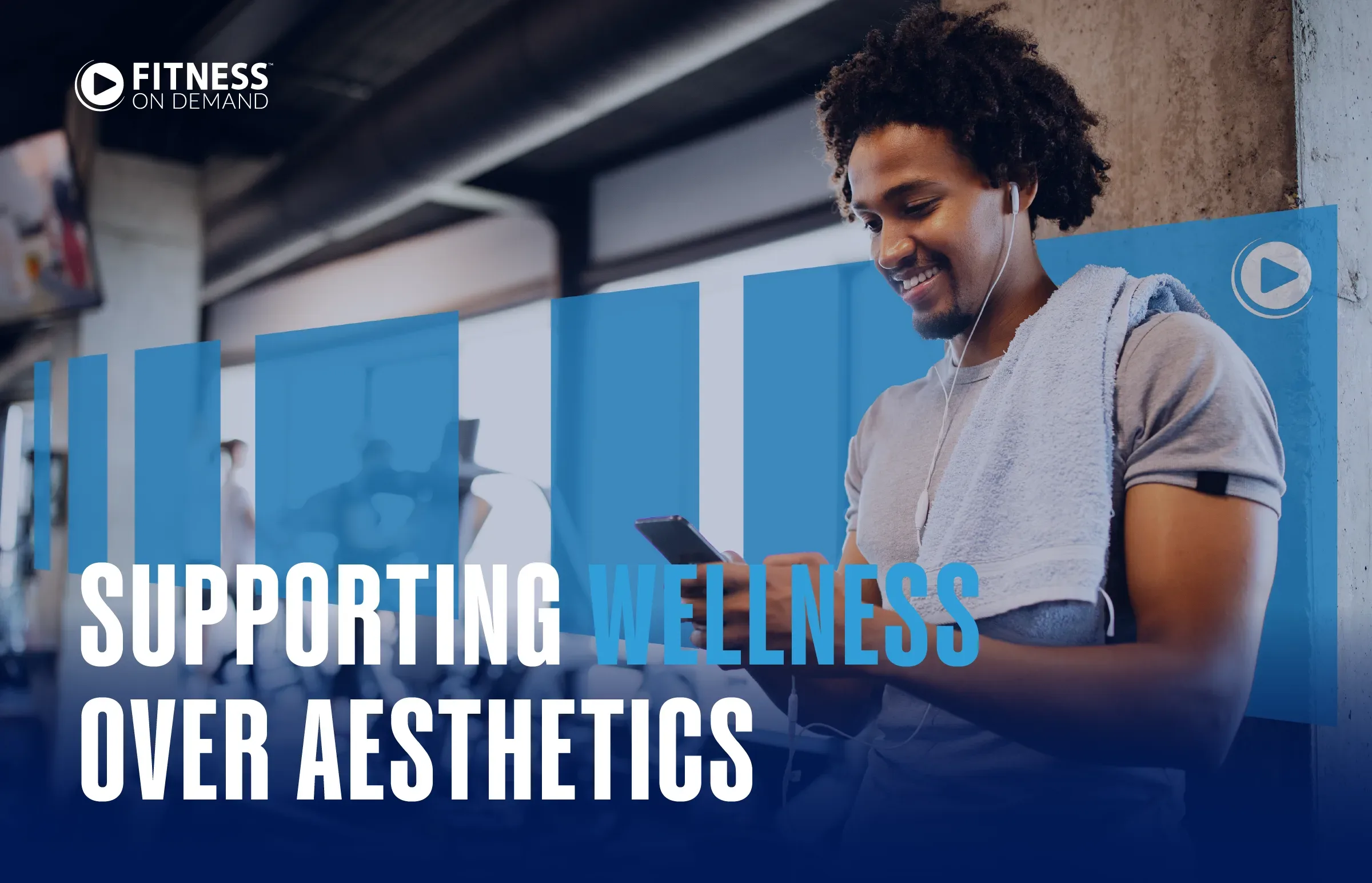 A smiling man with a towel around his neck uses his phone at the gym. Text reads: Fitness On Demand. Supporting Wellness Over Aesthetics. Blue graphic elements highlight the words wellness and aesthetics.