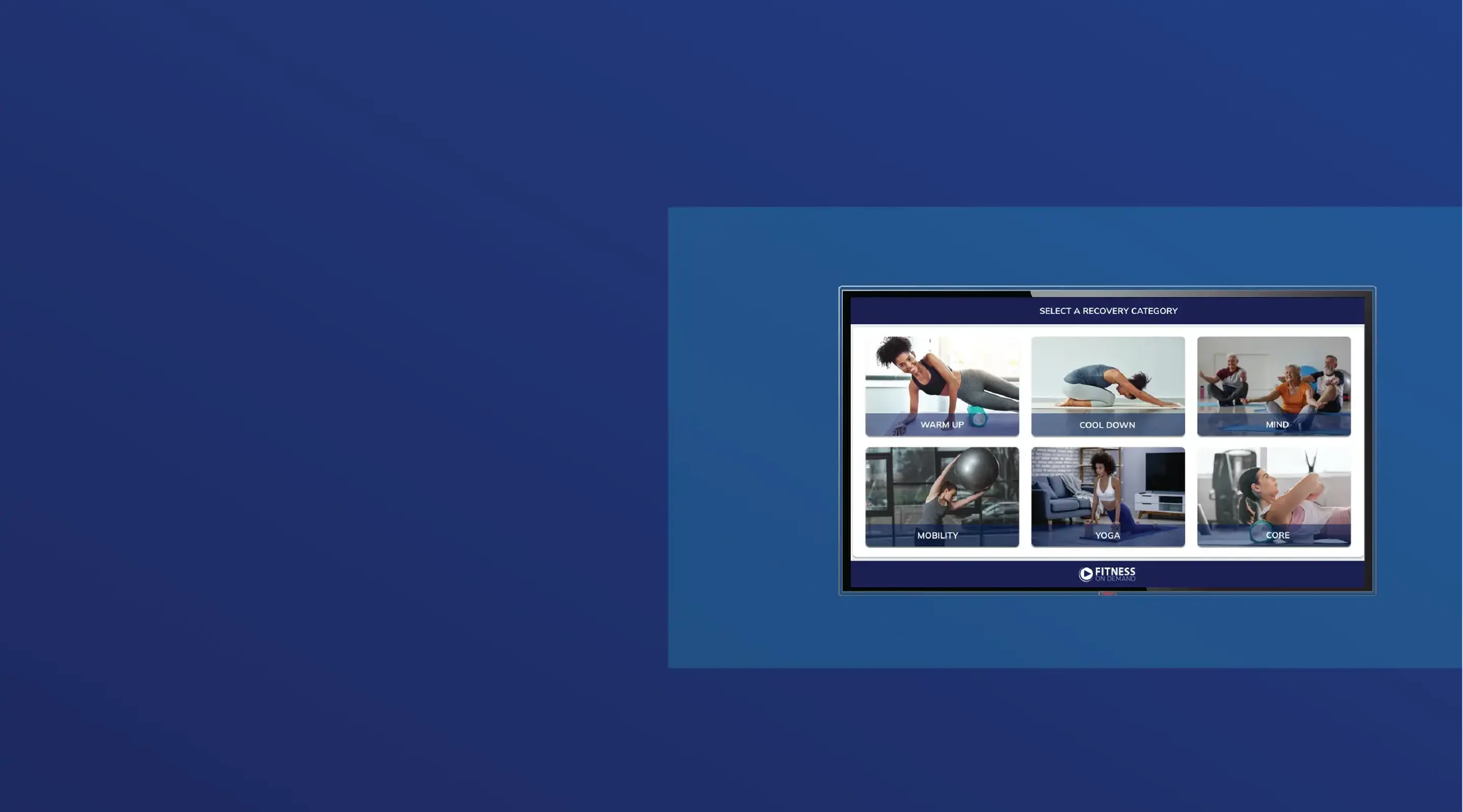 A digital kiosk screen displays six fitness class options with images of people exercising, set against a blue wall with ample empty space on the left.