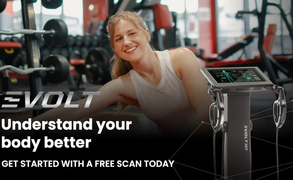 A smiling woman in a gym leans on an exercise bench, with an Evolt 360 body scan machine in the foreground. Text reads: Evolt. Understand your body better. Get started with a free scan today.